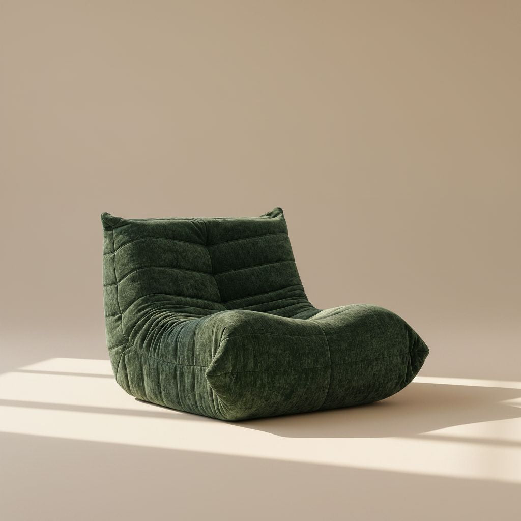 Green cushioned chair on a beige background